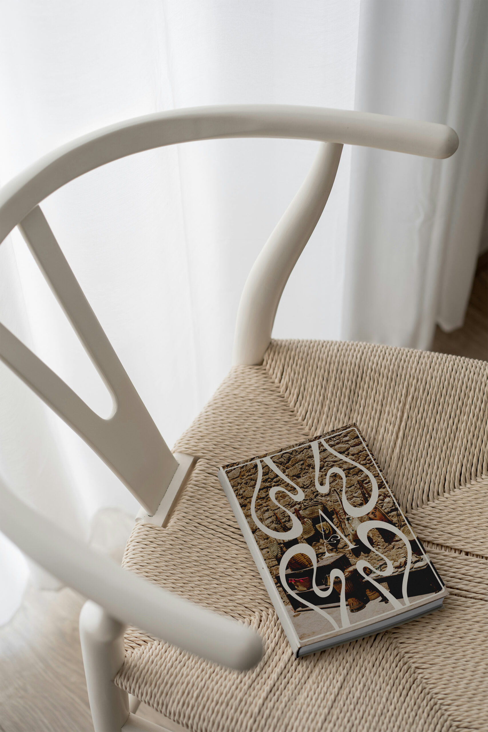 Free Book on Chair Mockup